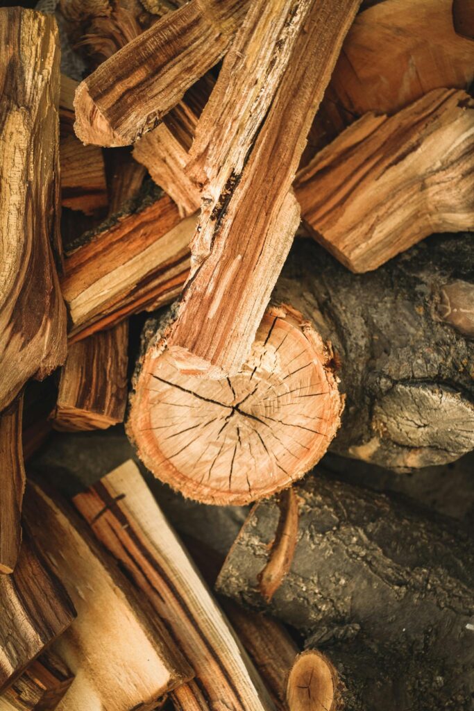 Detailed texture of chopped firewood in Uçhisar, showcasing natural wood grains.